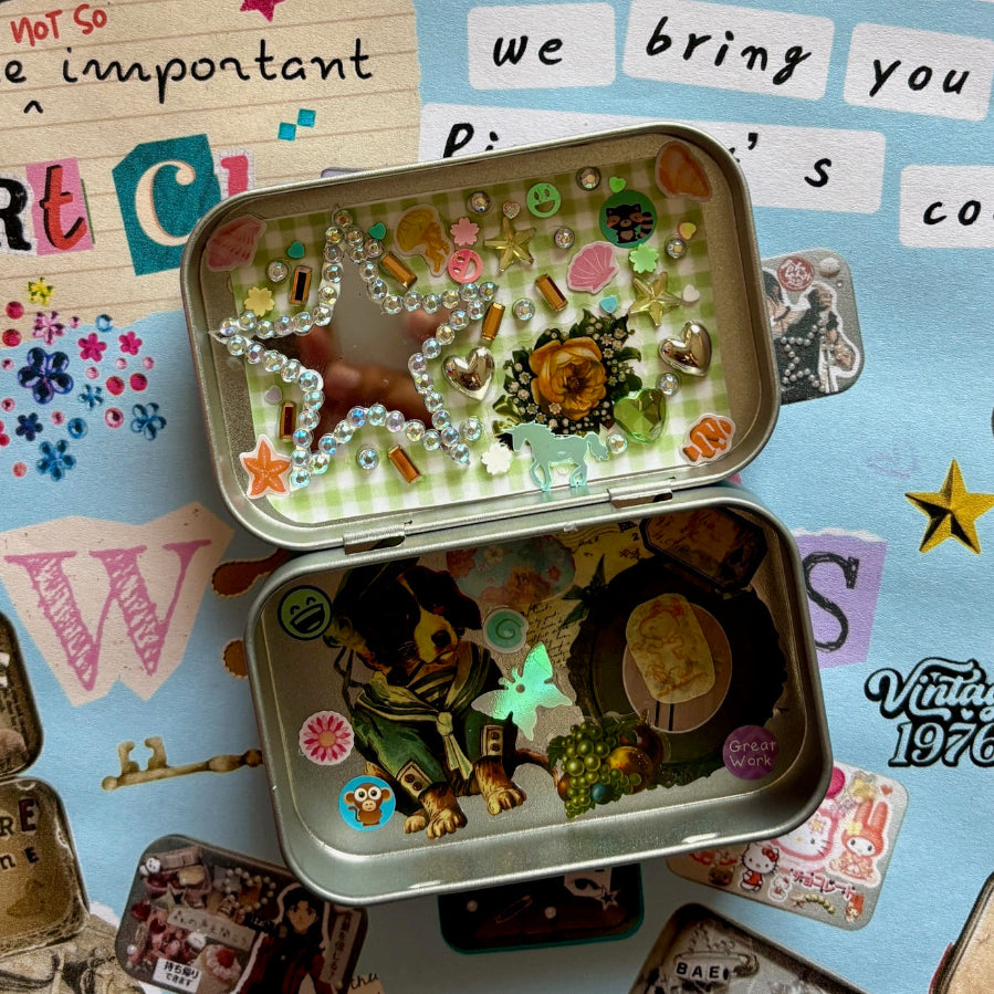 Decorative Altoid tin with stickers on a colorful background with letters and embellishmets.