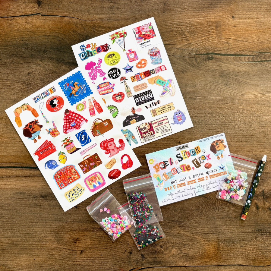 Colorful stickers and accessories on a wooden surface
