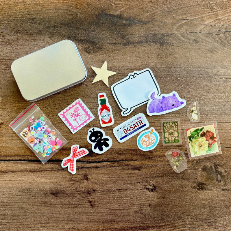 Collection of various stickers on a wooden surface